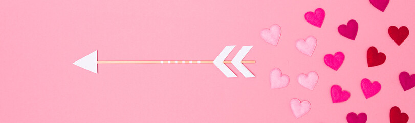 beautiful pink valentine background with love arrows and many hearts
