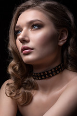 Beautiful girl on a gray background.