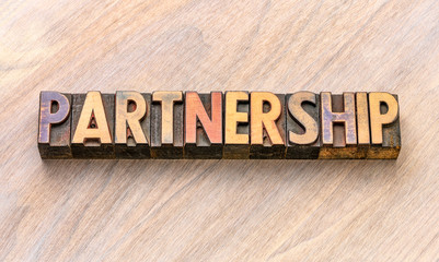 partnership word in wood type