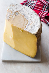 Piece of Turkish Old Kashar Cheese on Marble Surface.