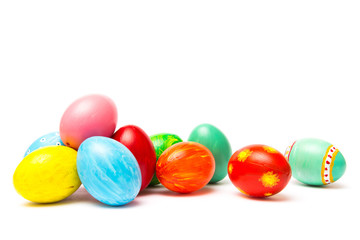 Easter background with handmade colored eggs.  Festive tradition on white backdrop