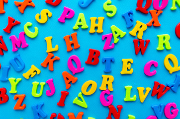 colored letters on blue background