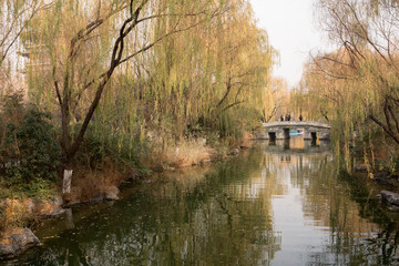 Fototapeta na wymiar View of the river and bridge in Jinan, Shandong province, China, autumn day