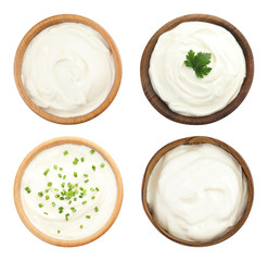 Set of delicious sour cream in bowls on white background, top view