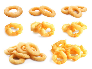 Set of delicious fried crispy onion rings on white background