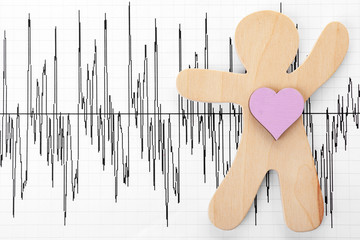 Human figure with heart on cardiogram, top view. Space for text
