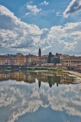 Fototapeta na wymiar Florence Reflections in The Arno River