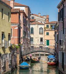 Fototapeta na wymiar Italy beauty, boats on typical canal street in Venice , Venezia
