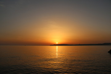 Fototapeta na wymiar sunset at sea above island Malta