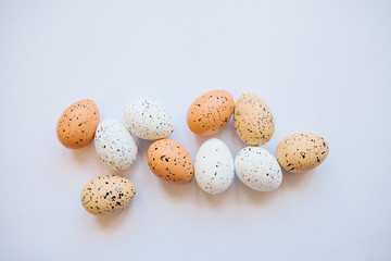 Set of eggs on a white background. Festive Easter background.
