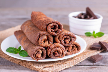 Thin crepes or blinis with chocolate cream