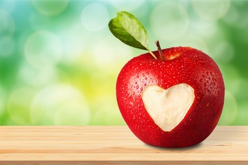 Red apple with a heart shaped
