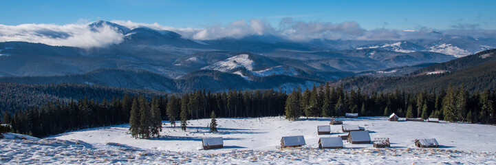 Beautiful winter panoramic view snow capped mountains