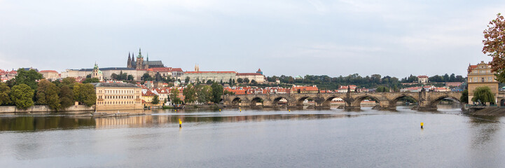 Fototapeta na wymiar Prague Castle and Charles Bridge crosses the Vitava river and supports the weight of 30 saints, Czech Republic