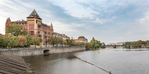 Obraz premium Stunning Prague architecture buildings and the embankment of the Vltava river, Czech Republic