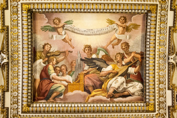 Fototapeta na wymiar Fresco de escena musical en techo de iglesia de Roma, Italia