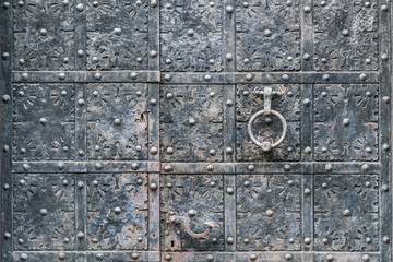 Old vintage metal door at the Swedish church with handles