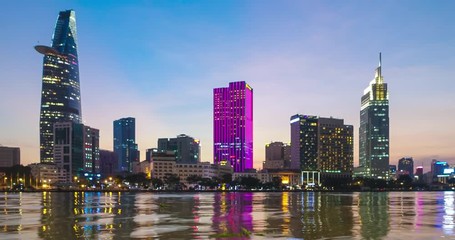 Time lapse landscape skyline sunset to night of Ho Chi Minh city or Sai Gon. Royalty high-quality stock footage time lapse Ho Chi Minh City in sunset to night. Timelapse or time lapse is fast video