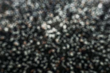 Abstract texture, background, black,  white and beyge bokeh.