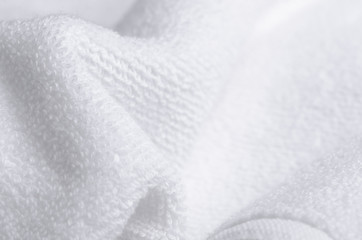 Obraz premium White towel macro fabric material soft bath blur background
