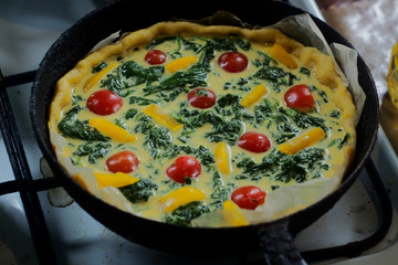 spinach pie with cherry tomatoes