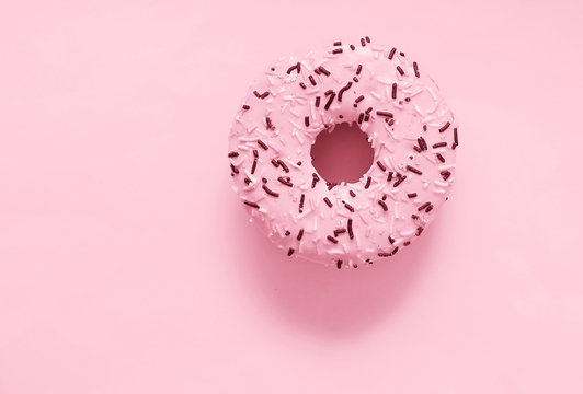 Abstract photo of pink donuts.
