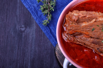 Borscht with beef. Traditional soup of Ukrainian and Russian cuisines. Copy space