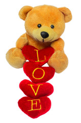 Toy bear with red heart isolated