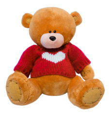 Toy bear with red heart isolated