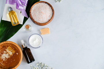 Spa natural skin care products background, cosmetic products creative layout with a space for a text, top view, flat lay