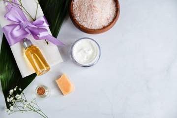 Spa natural skin care products background, cosmetic products creative layout with a space for a text, top view, flat lay