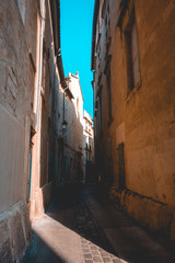 ancient street at france with darken shadows and small light leaks
