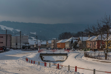 Path in Dubovica village in east Slovakia in snow frosty morning