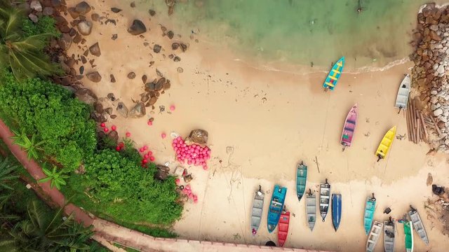 Top aerial view of crystal clear water and boats at Perhentian Island (Pulau Perhentian)