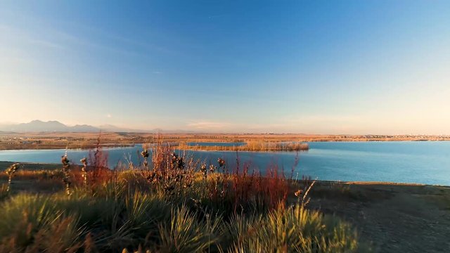 Low Flying Aerial of Colorado Lake at Sunset