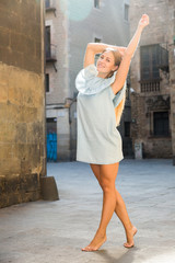 Girl posing barefoot in  Barcelona