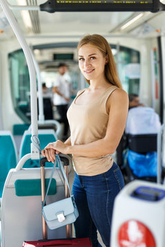 Woman traveling by subway train