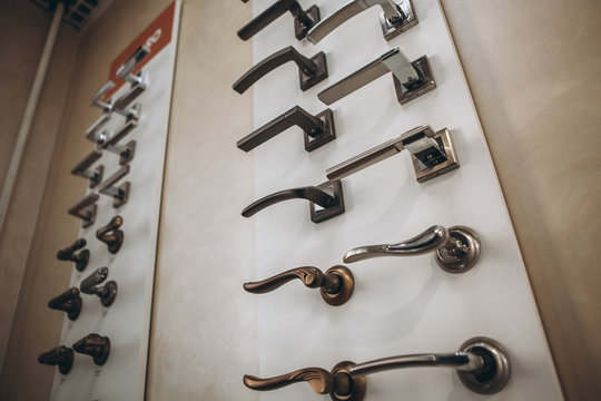 Showcase With Door Handles In Modern Shop Of Doors Hardware