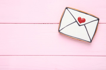 Valentine day cookie on pink wooden table