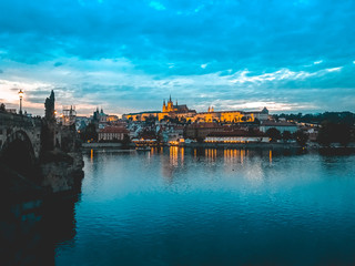 prague in the afternoon with cloudy background, Moldavia river and castle