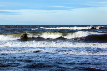 sea surface to the horizon with large waves and foam