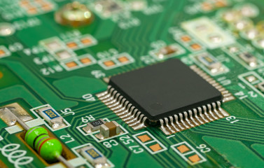 Single-chip controller on circuit board with strapping.