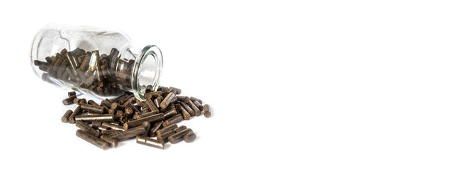 Torrefied wood pellets in a glass