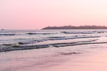 Beach view wallpaper, sunset at beach. Blurred photo with soft focus. Weligama, Sri lanka.