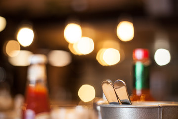 background of lights and Cutlery