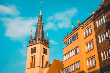 typical church building next to an apartment house at prague