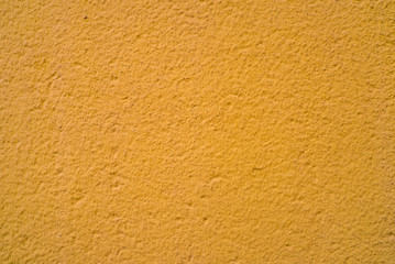 Orange wall texture. Background cement, orange plaster wall texture.