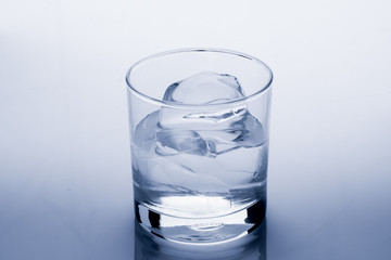 Ice cube melts in studio: Global warming concept