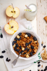 Breakfast granola  with milk. style vintage.