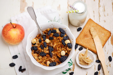 Breakfast granola  with milk. style vintage.